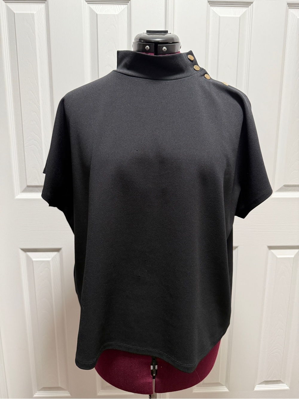 Ann Taylor Black Short-Sleeve Mock Neck Top with Gold Shoulder Buttons